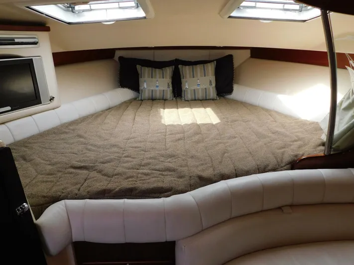  Yacht Photos Pics Luxurious cabin interior of 2008 Grady-White Express 360 boat with cozy bedding.