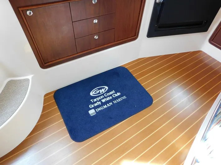  Yacht Photos Pics 2008 Grady-White Express 360 interior with wooden flooring and branded mat.