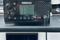 Simrad marine radio on 2022 Axopar 22 T-Top boat dashboard.