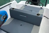2022 Axopar 22 T-Top boat seating with cup holders, featuring sleek design and comfort.