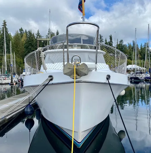 First Light Yacht Photos Pics Ocean Alexander 510 Pilothouse yacht, 1999 model, docked at marina.