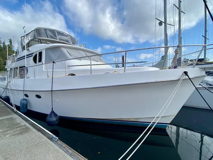 First Light Yacht Photos Pics 1999 Ocean Alexander 510 Pilothouse yacht docked at marina.