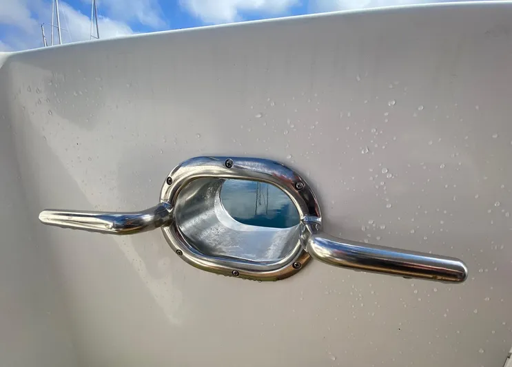 First Light Yacht Photos Pics Close-up of a porthole on the 1999 Ocean Alexander 510 Pilothouse.