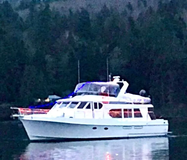First Light Yacht Photos Pics 1999 Ocean Alexander 510 Pilothouse on calm water.