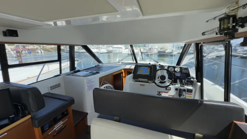  Yacht Photos Pics Interior view of 2016 Jeanneau Velasco 37F yacht cockpit with navigation equipment.