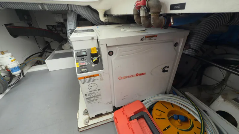  Yacht Photos Pics Engine room of 2016 Jeanneau Velasco 37F with Cummins Onan generator.