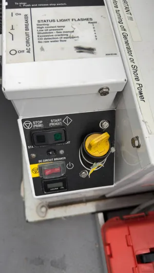  Yacht Photos Pics Control panel of a 2016 Jeanneau Velasco 37F boat, featuring various switches and indicators.