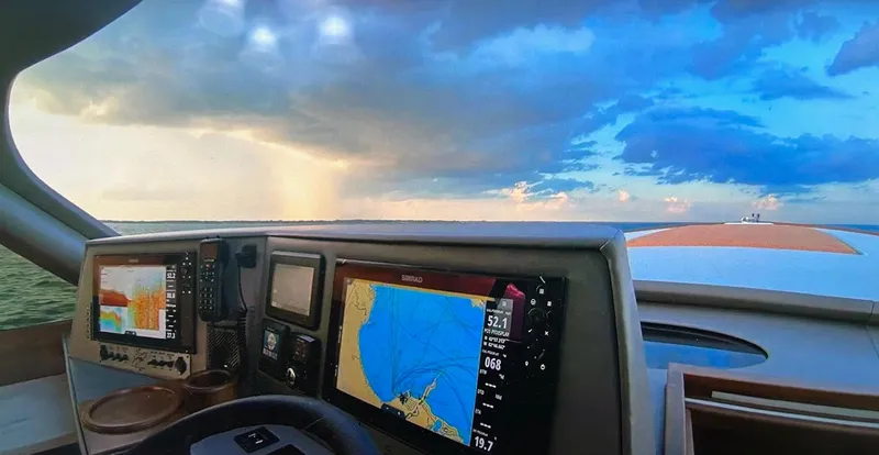 Jet Stream Yacht Photos Pics Cockpit view of 2018 Spencer Yachts JET BOAT with navigation screens and ocean horizon.