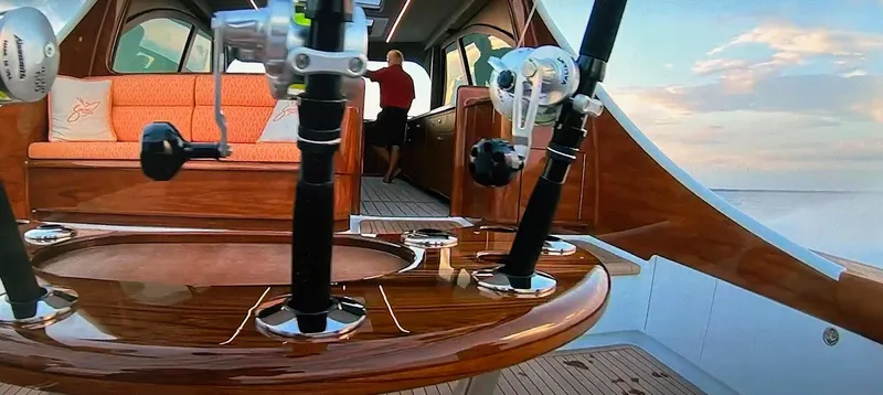 Jet Stream Yacht Photos Pics Interior of 2018 Spencer Yachts JET BOAT with fishing rods and wooden seating.