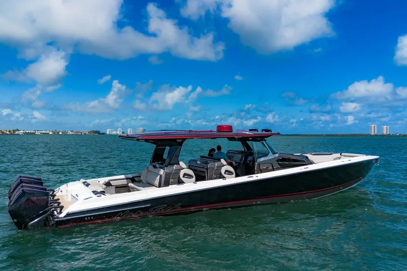  Yacht Photos Pics 2023 Nor-Tech 500 Sport Center Console boat on open water under blue sky.
