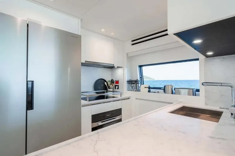 La Valletta Yacht Photos Pics Modern kitchen interior on 2024 Sanlorenzo SX76 yacht with ocean view.