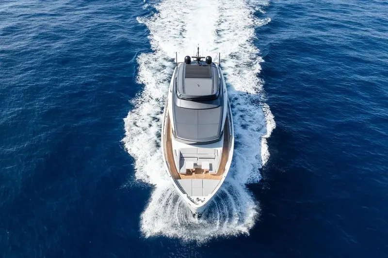 La Valletta Yacht Photos Pics 2024 Sanlorenzo SX76 yacht cruising on open sea, aerial view.