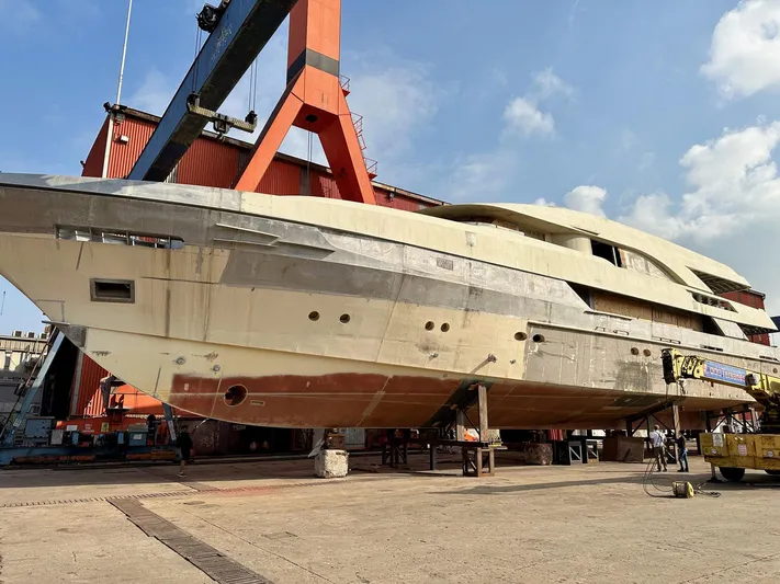  Yacht Photos Pics Trinity Yachts Custom T052 yacht under construction, 2026 model, in shipyard setting.