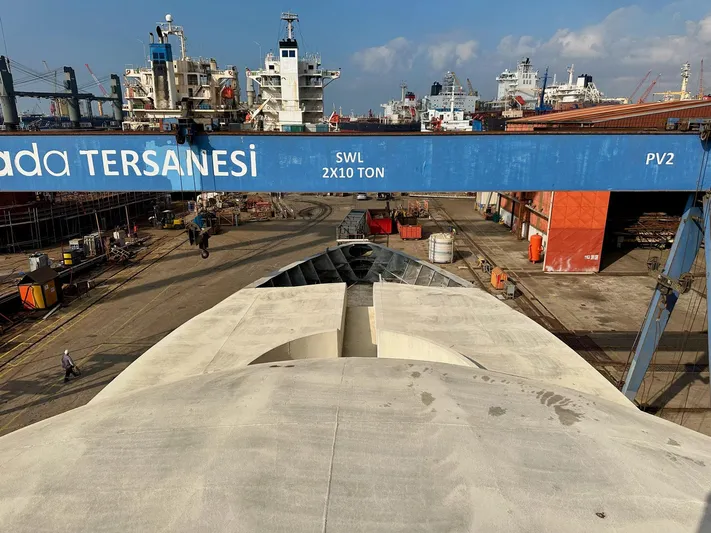  Yacht Photos Pics Shipyard scene with Trinity Yachts Custom T052 under construction, 2026 model.