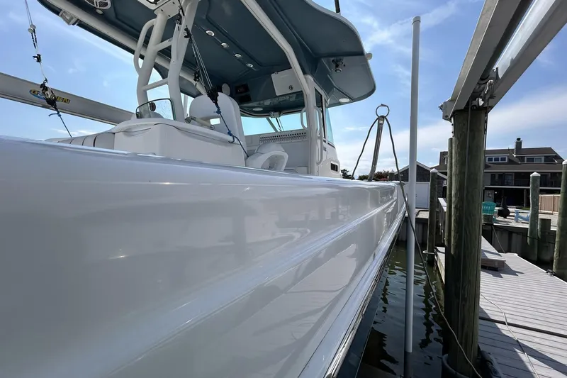 Pebbles Yacht Photos Pics 2008 Everglades 350 CC boat docked, showcasing sleek design and modern features.