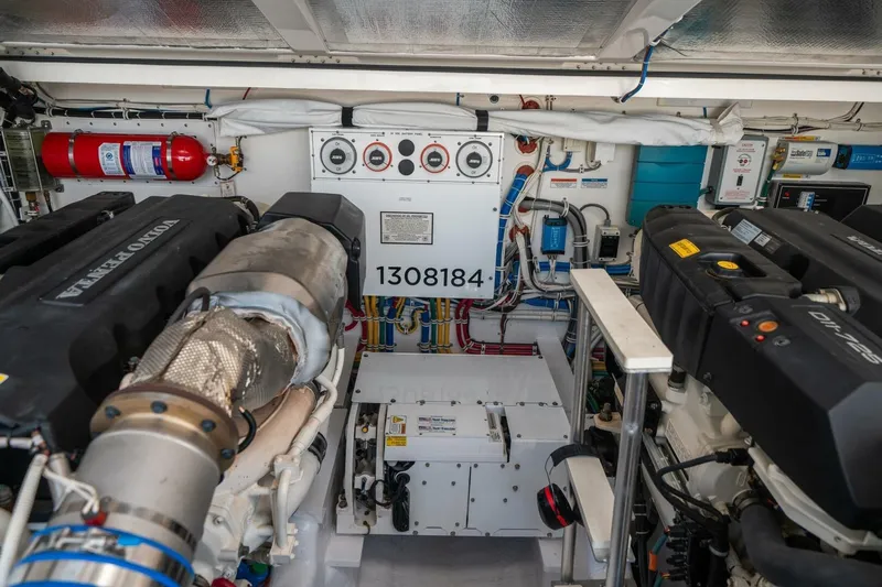 Big Hit Yacht Photos Pics Engine room of 2020 Cabo 40 Express boat with Volvo Penta engines and control panel.