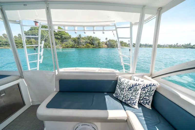 Big Hit Yacht Photos Pics Interior view of 2020 Cabo 40 Express yacht with scenic ocean backdrop.