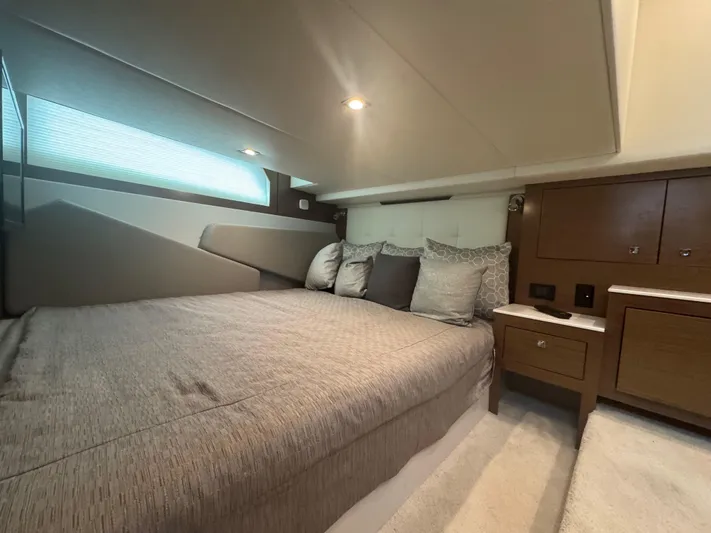 Determination Yacht Photos Pics Luxurious bedroom interior of 2020 Cruisers Yachts 39 Express Coupe with modern design.