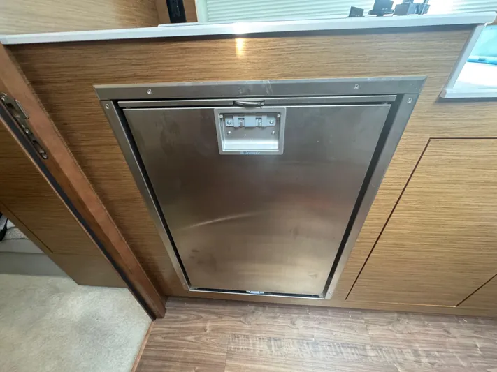 Determination Yacht Photos Pics Built-in stainless steel appliance in 2020 Cruisers Yachts 39 Express Coupe interior.