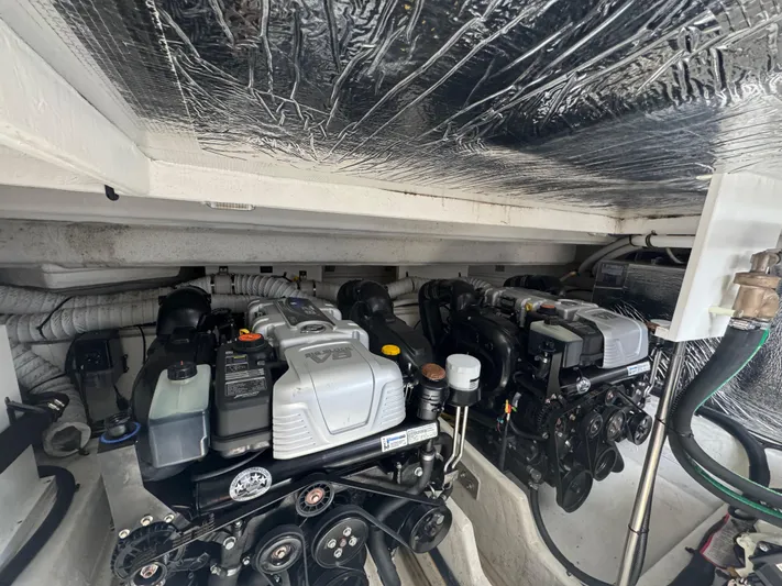 Determination Yacht Photos Pics Engine compartment of 2020 Cruisers Yachts 39 Express Coupe, showcasing dual engines.