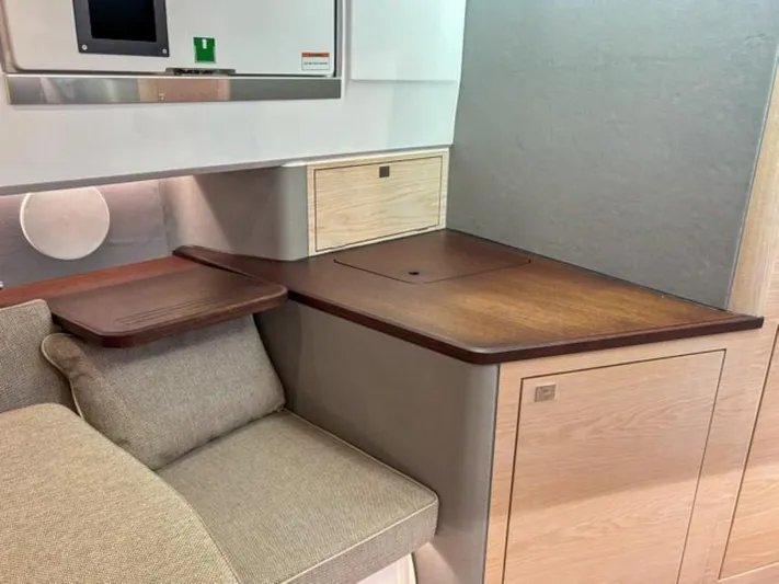  Yacht Photos Pics 2024 Axopar 45 XC Cross Cabin interior with modern wood and fabric finishes.