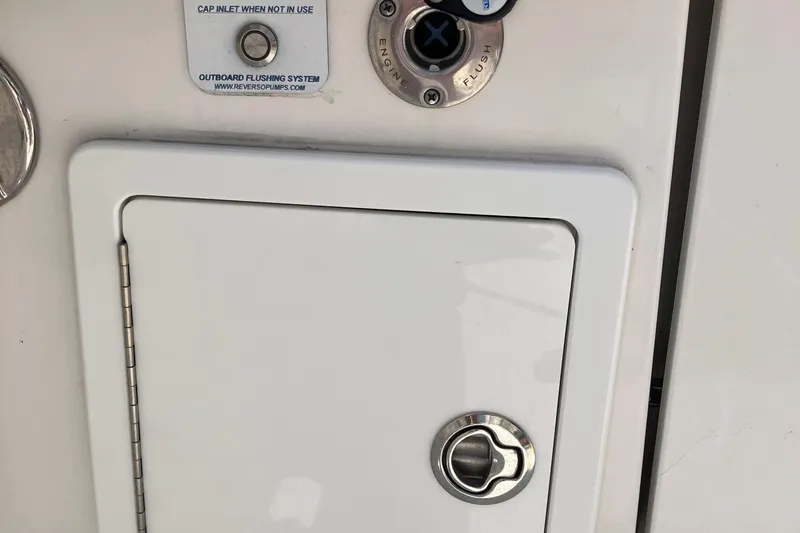 Yacht Photos Pics 2020 Regulator 31 boat outboard flushing system and storage compartment.