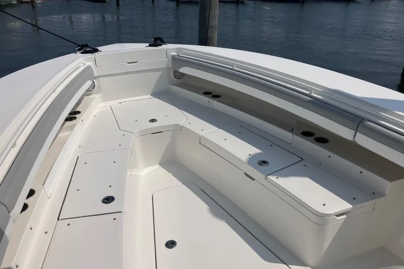 Yacht Photos Pics 2020 Regulator 31 boat interior with spacious seating and storage compartments.