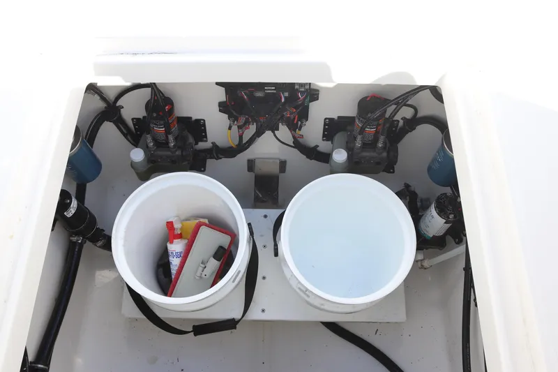  Yacht Photos Pics 2020 Regulator 31 boat storage compartment with equipment and supplies.
