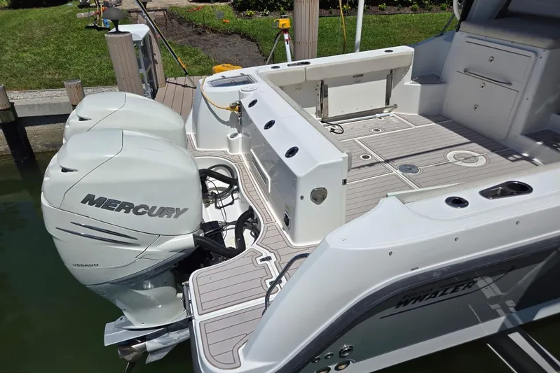  Yacht Photos Pics Boston Whaler 315 Conquest 2016 with Mercury engines at dock.
