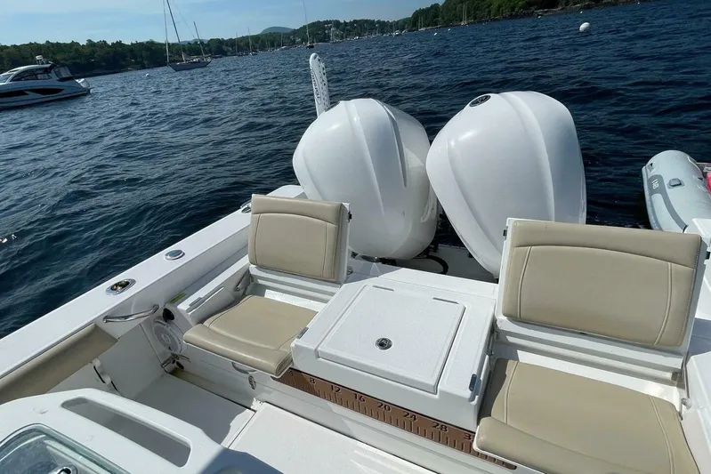  Yacht Photos Pics 2019 Everglades 273 Center Console boat with dual engines on a scenic lake.