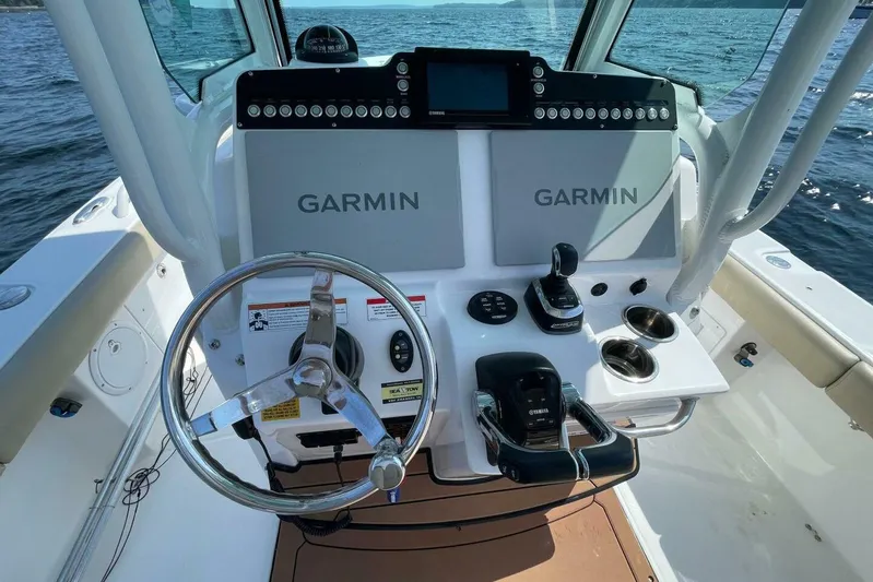  Yacht Photos Pics 2019 Everglades 273 Center Console boat dashboard with Garmin navigation system.