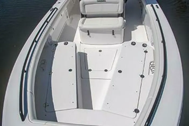  Yacht Photos Pics 2019 Everglades 273 Center Console boat interior with seating and storage compartments.