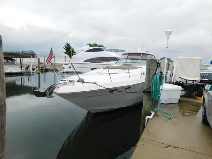  Yacht Photos Pics 2004 Sea Ray 600 Sun Sport docked at marina.