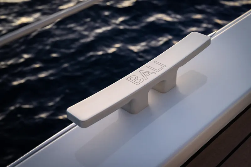  Yacht Photos Pics Bali 5.8 yacht cleat on deck, 2026 model, with ocean background.