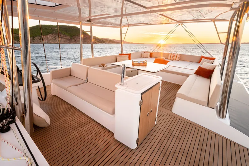  Yacht Photos Pics Luxurious Bali 5.8 yacht interior with sunset view, featuring elegant seating and modern design, 2026 model.