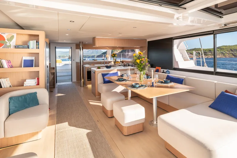  Yacht Photos Pics Luxurious interior of 2026 Bali 5.8 yacht with elegant dining area and ocean view.