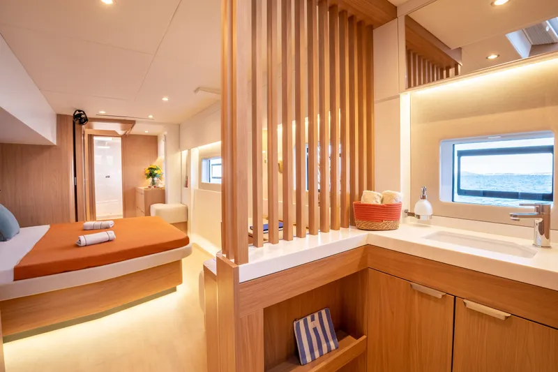  Yacht Photos Pics Luxurious interior of 2026 Bali 5.8 yacht featuring modern bedroom and bathroom design.
