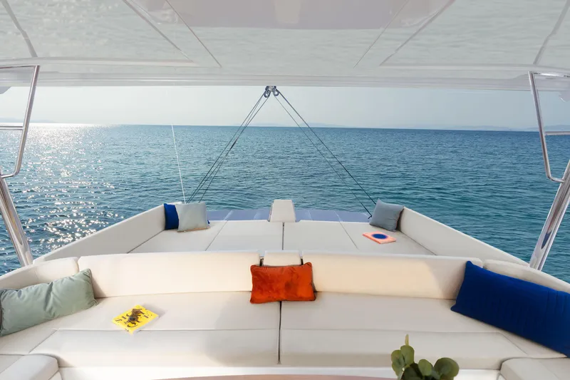  Yacht Photos Pics Luxurious Bali 5.8 yacht interior, 2026 model, with ocean view and comfortable seating.