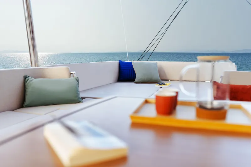  Yacht Photos Pics Luxurious Bali 5.8 yacht interior, 2026 model, with ocean view and cozy seating area.