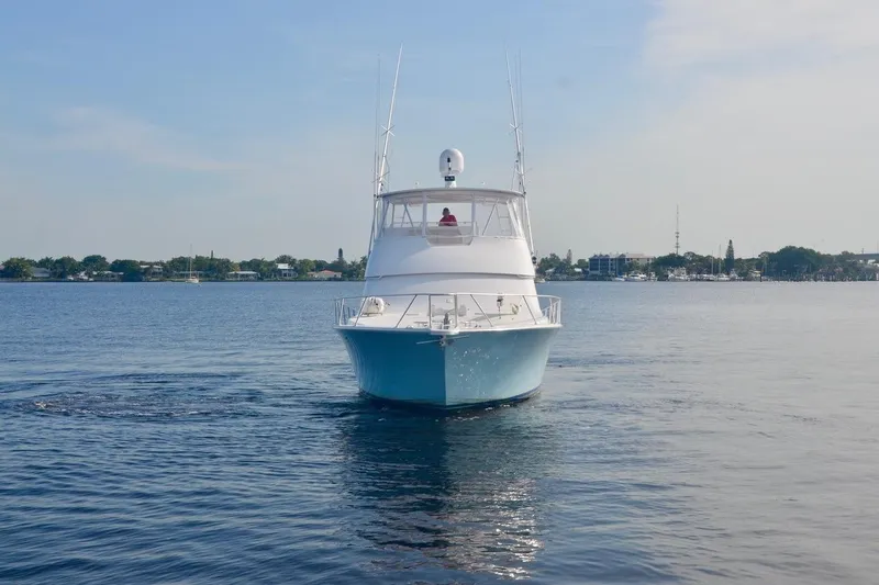 No Worries II Yacht Photos Pics 2009 Viking 54 Convertible yacht cruising on calm waters.