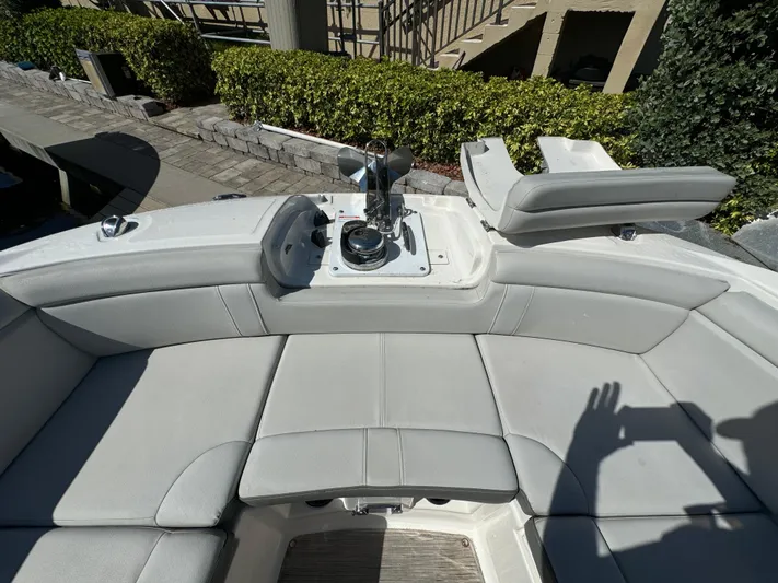  Yacht Photos Pics 2020 Sea Ray SDX 290 Outboard boat interior with cushioned seating and control panel.