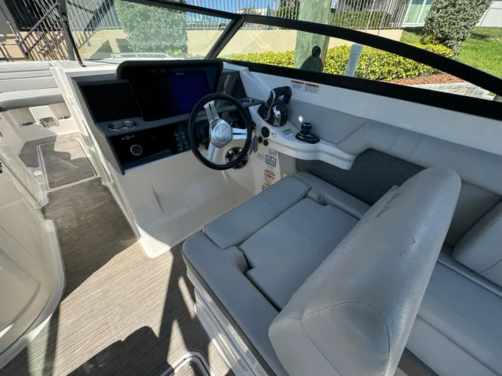  Yacht Photos Pics 2020 Sea Ray SDX 290 Outboard boat interior with modern helm and seating.