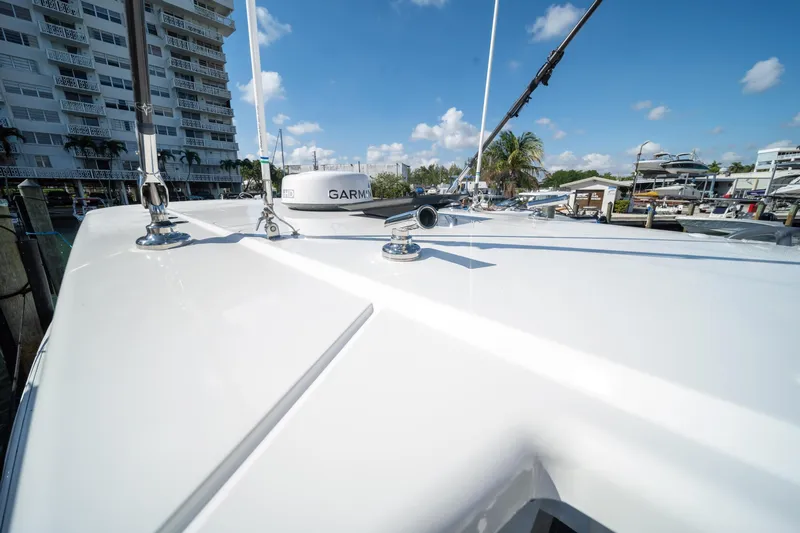  Yacht Photos Pics 2022 World Cat 400 CC-X boat deck with Garmin equipment, docked in marina.