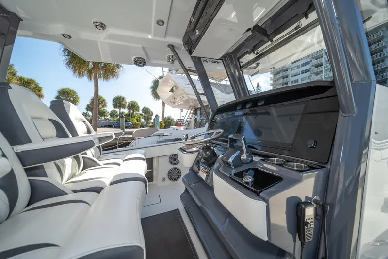  Yacht Photos Pics Interior of 2022 World Cat 400 CC-X boat with modern helm and seating.