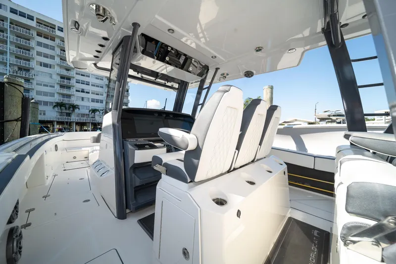  Yacht Photos Pics 2022 World Cat 400 CC-X boat interior with modern helm and seating.