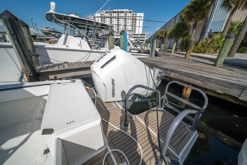  Yacht Photos Pics 2022 World Cat 400 CC-X boat docked with Mercury outboard engine.