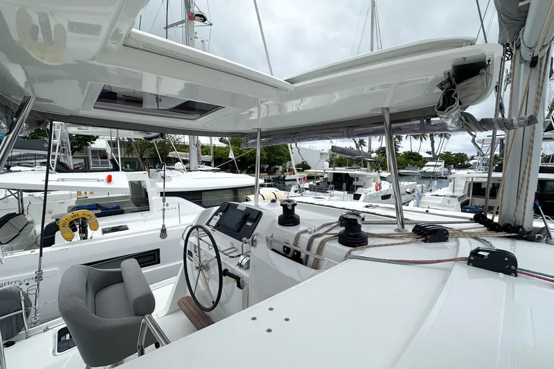 Island Riff Yacht Photos Pics Modern Lagoon 42 catamaran cockpit, 2025 model, featuring sleek design and advanced navigation equipment.