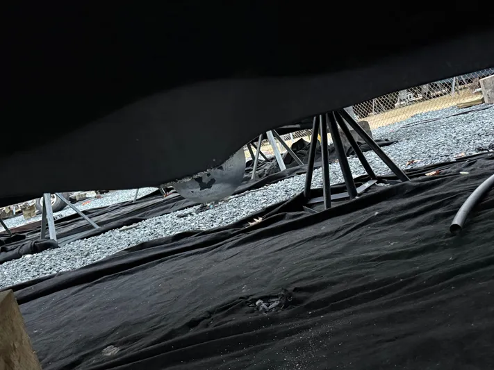 Wrangler Yacht Photos Pics Underside of a Pursuit 3400 Express boat on stands.