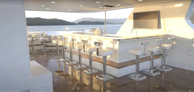 Jackpot Yacht Photos Pics Luxury yacht bar area on Christensen Model Year 2020, with ocean view.