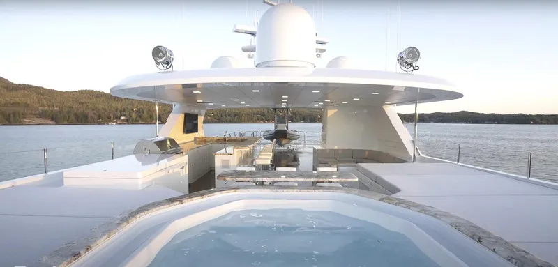 Jackpot Yacht Photos Pics Luxurious 2020 Christensen yacht with hot tub and outdoor dining area on deck.